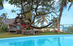 Casa Flamboyant na Praia da Peroba Icapuí CE vista mar, piscina, caiaques, jardim florido e cozinheiro incluso